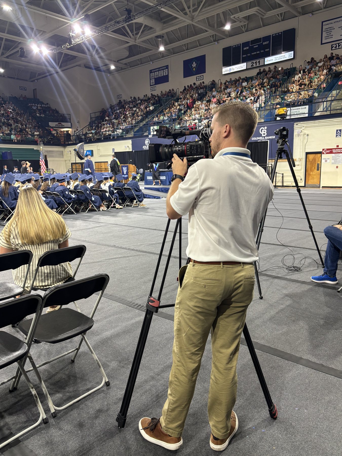 Matt Bennett working in the field with a camera